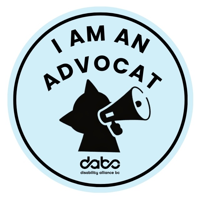 light blue pin that says "I am an Advocat with an illustration of a black cat holding a megaphone and the DABC logo.