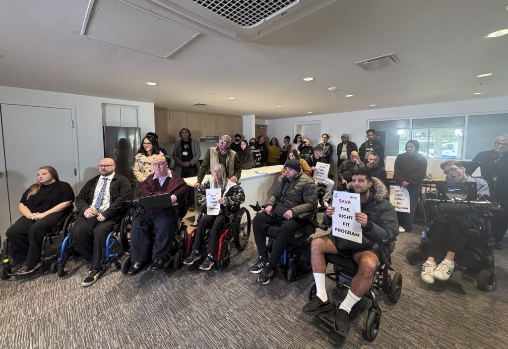 A group of people attend the press conference to save the Right Fit Program